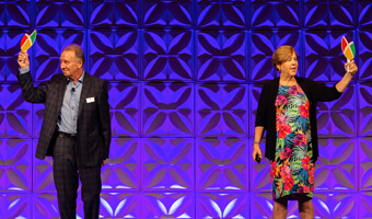 A man and a woman on stage